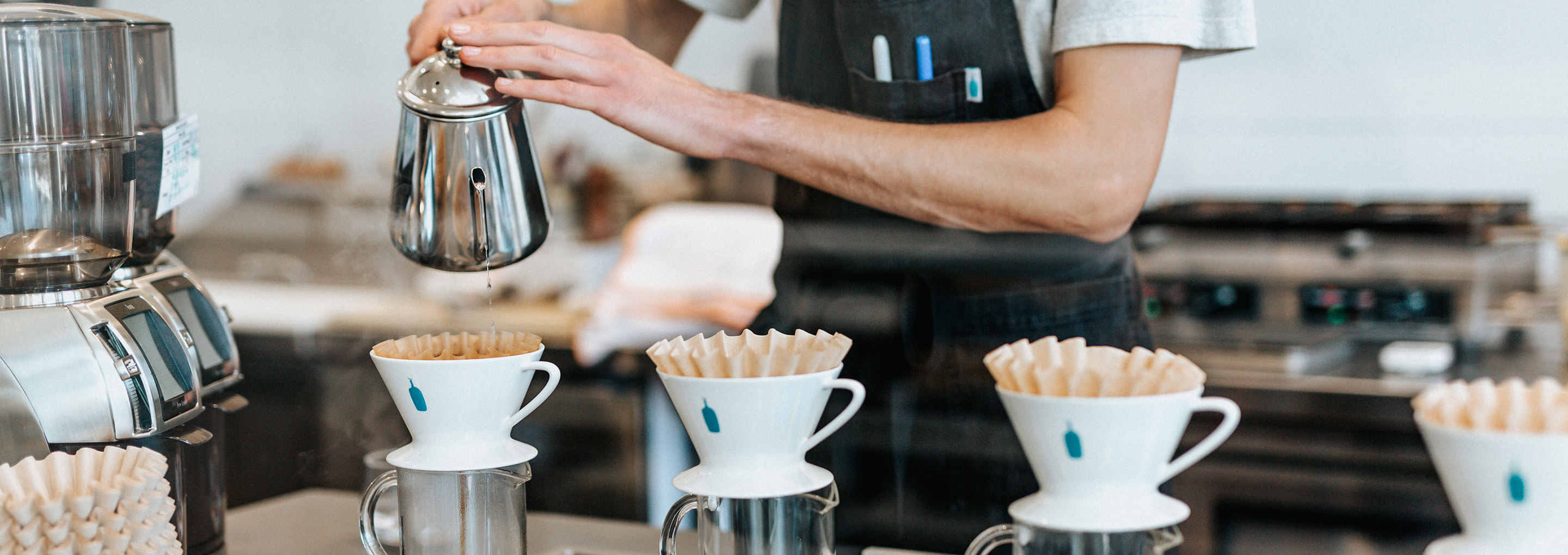 Person preparing coffee